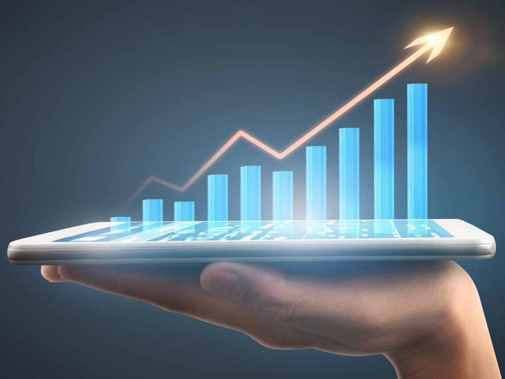 Tablet met daarop een staafdiagram waarbij met een onwaardste trend.