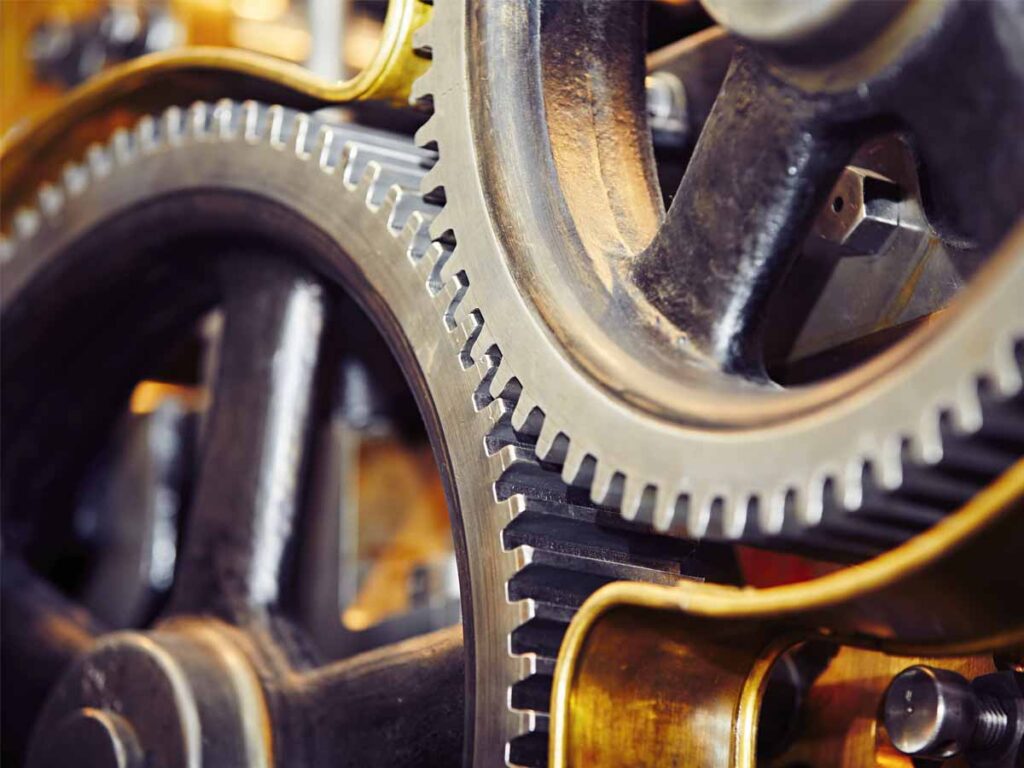 Twee radertjes die precies in elkaar lopen.